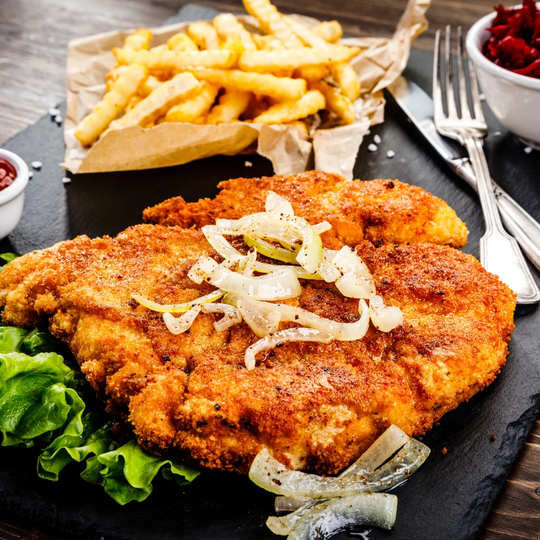 Paniertes Schnitzel Bergisch: Knusprig mit Haferflocken und Kräutern