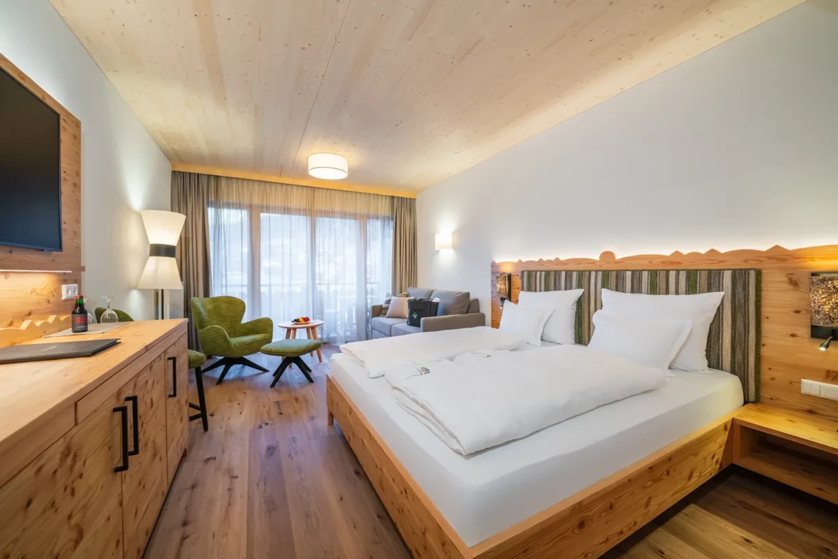 Hotelurlaub mit E-Auto im Trattlerhof: Nachhaltig reisen in Kärnten